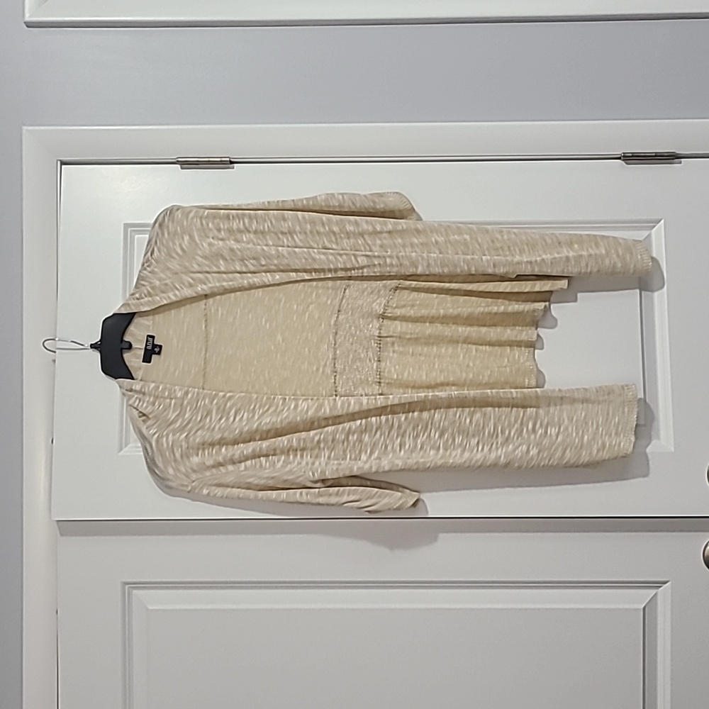 A.n.a woman's tan and white sweater